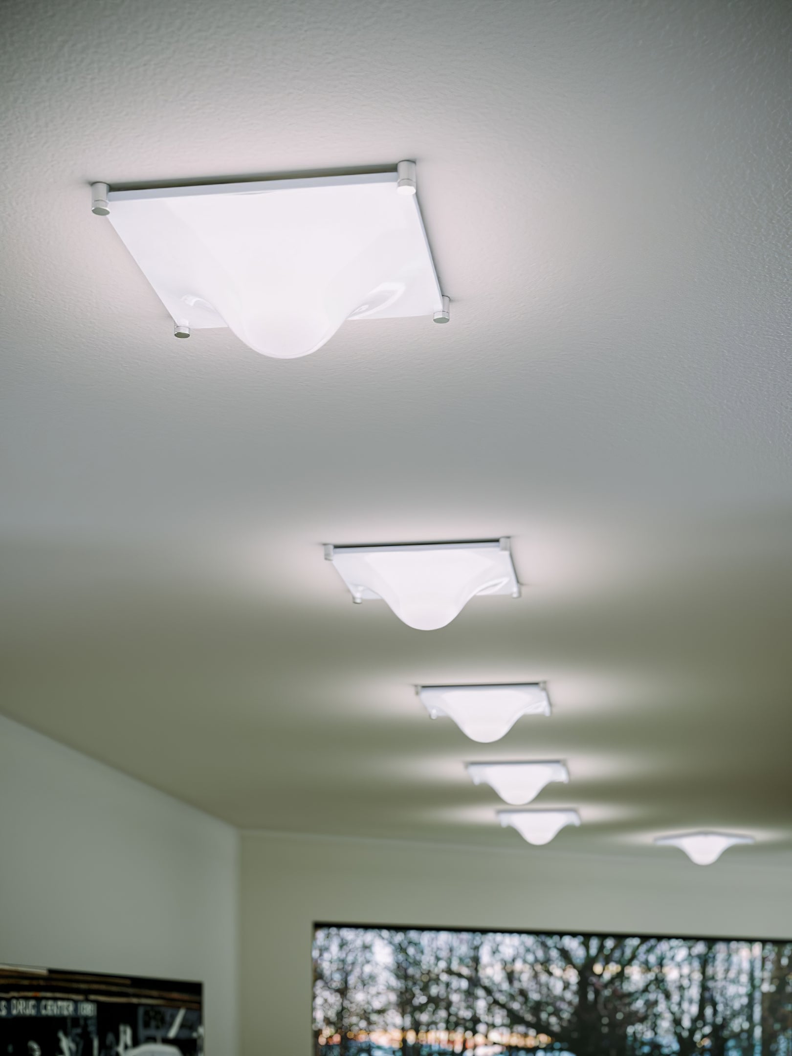 Bolla Lustre Plafonnier Blanc Doux Courbes Élégant