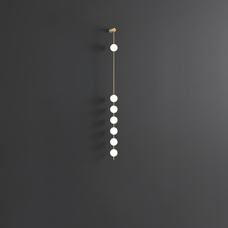 Lustra Applique Murale Sphères Verticales Laiton
