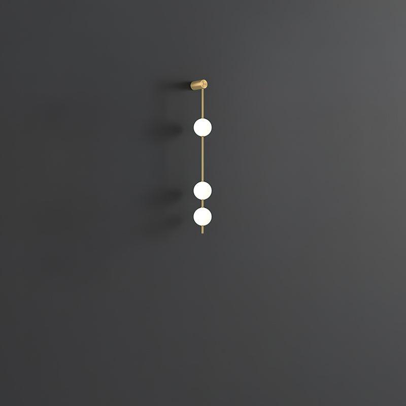 Lustra Applique Murale Sphères Verticales Laiton