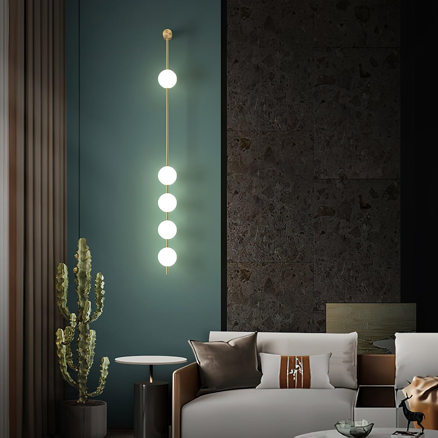 Lustra Applique Murale Sphères Verticales Laiton